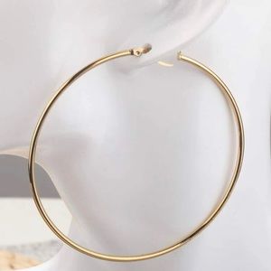 Everyone needs a cute pair of big gold hoops.